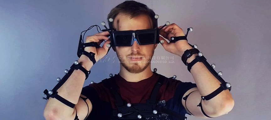 engineer-wearing-a-bodytracking-suit-and-who-is-not-affected-by-motion-sickness-in-vr-1.jpeg engineer-wearing-a-bodytracking-suit-and-who-is-not-affected-by-motion-sickness-in-vr-1.jpeg